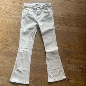 ZARA girls cream flare leg jeans.
